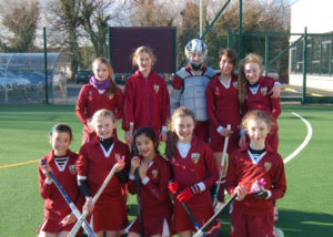 The A Team Girls Hockey players in a team photo