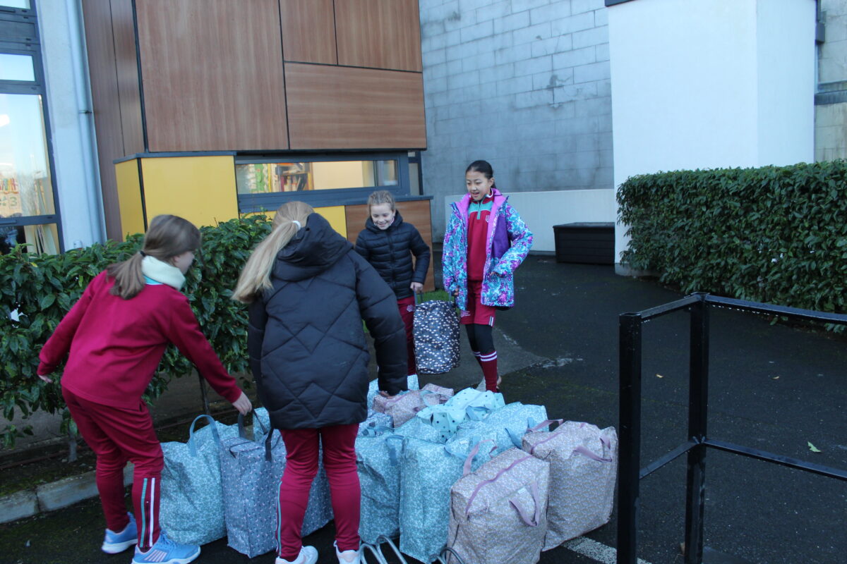 School girls gathering Christmas Hampers