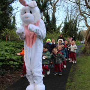 A picture of the Easter Bunny hopping through Castle Park Forest