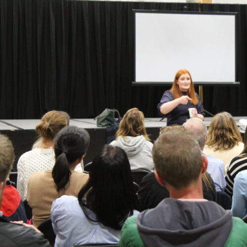 A photo of Joanna giving a talk at Castle Park School